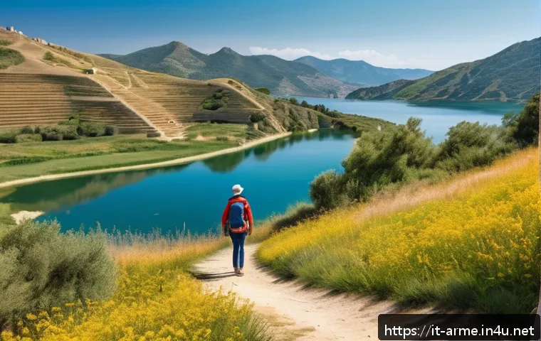 세반호수에서 즐기는 액티비티 - A serene hiking trail winding through the gentle hills surrounding Lake Cebano, featuring lush nativ...